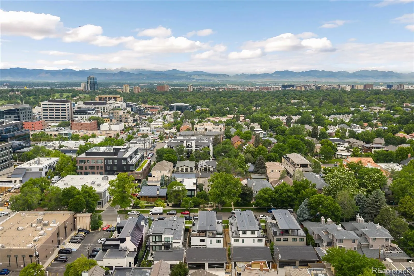 Aerial view of the 340 Jackson Street block with the mountains beyond