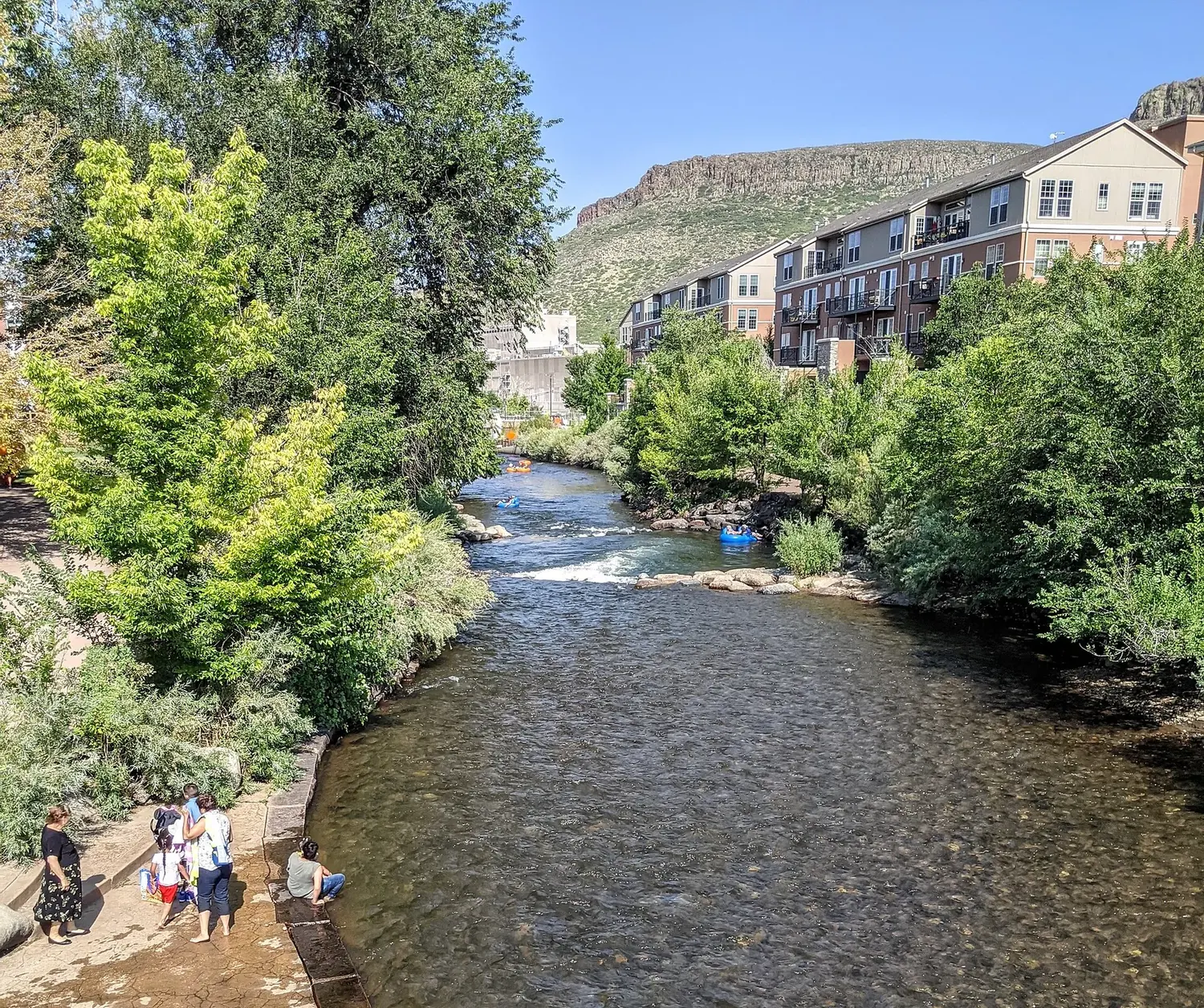 Clear Creek running through downtown Golden, Colorado below South Table Mountain